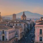 a view of a city with a mountain in the background